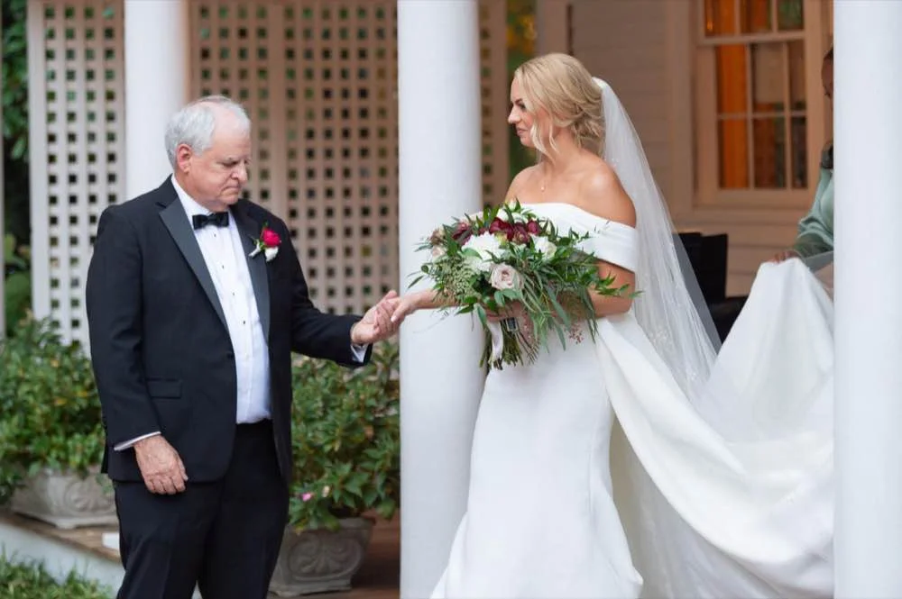 Film photo of Bride being escorted by her father