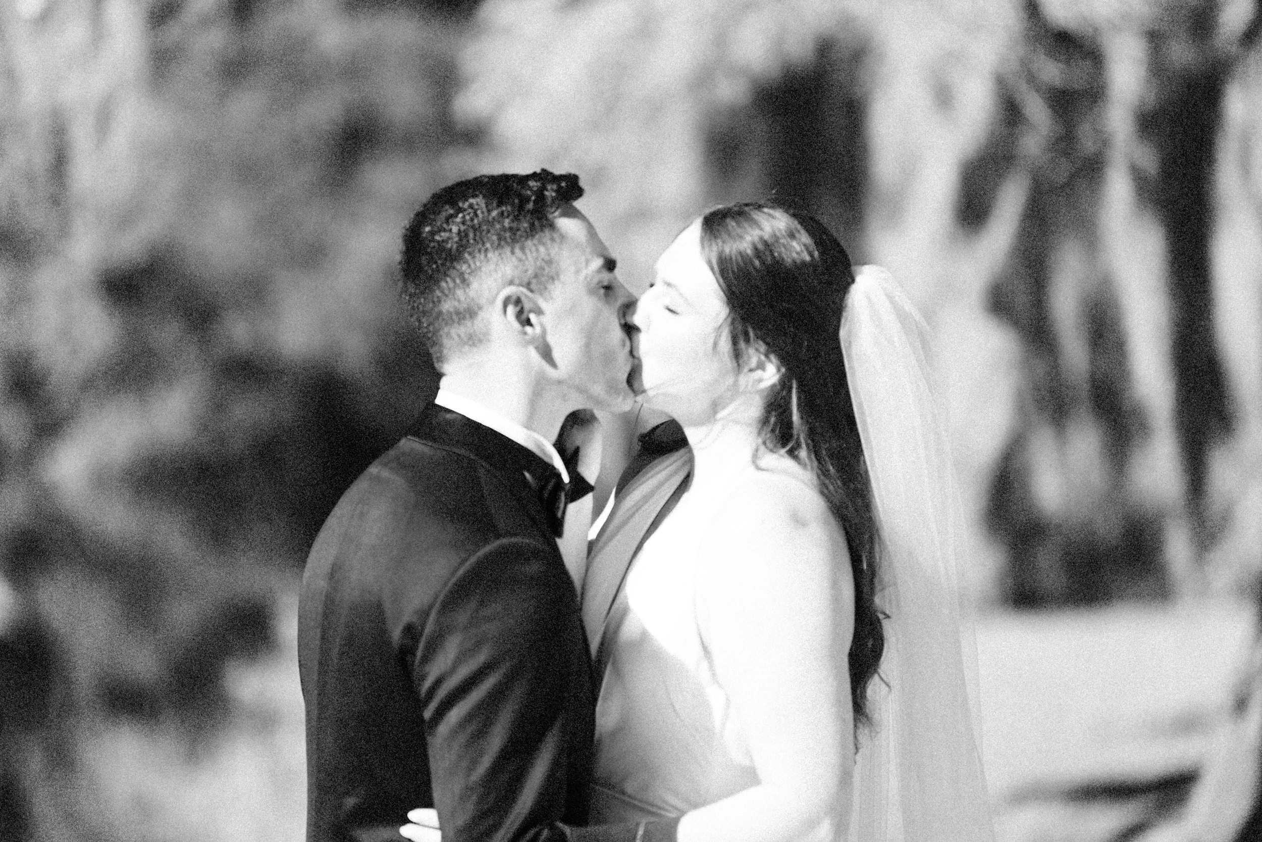 Bride and groom kissing at Lovegrove Estate in Summerillve, SC